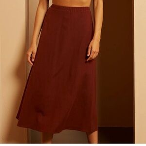 Crescent linen blend midi skirt rust brown size large
Montana